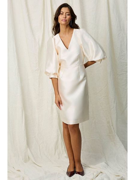 Joelle Sukienka w kolorze kremowym rozmiar: 38. Brązowe sukienki Joelle, bez wzorów, bez kołnierzyka, bez ramiączek, midi. Za 154.07 zł.