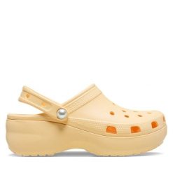 Klapki Crocs. Żółte klapki Crocs, bez wzorów, bez obcasa, bez zapięcia. Za 189.99 zł.