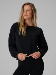4F Bluza dresowa regular z modalem damska - czarna XL. Czarne bluzy 4f, xl, bez wzorów, z dresówki, bez kaptura, na fitness i siłownię. Za 169.99 zł.