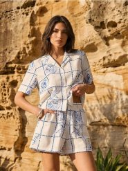 Koszula z morskim nadrukiem, z wiskozą - wielobarwny. Zielone koszule Sinsay, l, bez wzorów, z wiskozy, bez kołnierzyka, bez ramiączek. Za 39.99 zł.