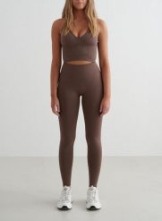 Damskie legginsy bezszwowe, wysoki stan, squat proof petite Shape brąz macchiato. Brązowe legginsy AIM'N, bez wzorów, z elastanu, street. Za 296.00 zł.