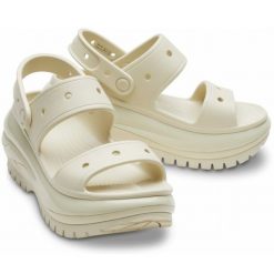 Klapki Crocs Mega Crush Sandal 207989-2Y2 beżowy. Brązowe klapki bez wzorów, casualowe, bez obcasa, na platformie, bez zapięcia. Za 449.26 zł.