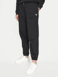 Guess Jeans Spodnie dresowe W4YB33 KC811 Czarny Regular Fit. Czarne spodnie dresowe Guess Jeans, z aplikacjami, z bawełny. Za 209.99 zł.