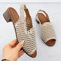 Skórzane sandały damskie ażurowe na obcasie beżowe T.Sokolski L25-707. Brązowe sandały T.Sokolski, w ażurowe wzory, z materiału, eleganckie, bez obcasa, na obcasie, bez zapięcia. Za 165.00 zł.