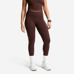 Legginsy fitness damskie Domyos wysoki stan. Brązowe legginsy DOMYOS, bez wzorów, z elastanu, sportowe. Za 119.99 zł.
