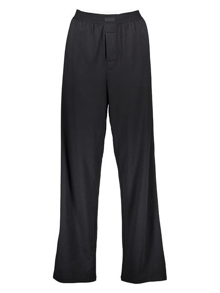 Skims Spodnie w kolorze czarnym rozmiar: M. Czarne spodnie materiałowe Skims, bez wzorów, z materiału. Za 223.46 zł.