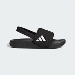 Klapki Adilette Estrap 2.0 Slides Children. Białe klapki adidas, bez wzorów, sportowe, bez obcasa, bez zapięcia. Za 109.00 zł.
