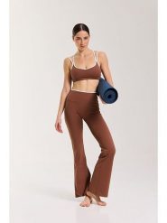 Onamaste Legginsy sportowe "Flair Yska" w kolorze jasnobrązowym rozmiar: S/M. Brązowe legginsy sportowe Onamaste, m, bez wzorów, z materiału, z podwyższonym stanem, outdoorowe. Za 130.99 zł.