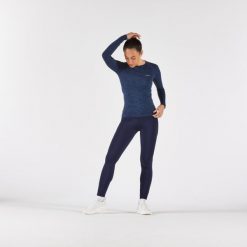 Legginsy do biegania damskie Kiprun Run 500 Warm ocieplane. Niebieskie legginsy KIPRUN, bez wzorów, z elastanu, sportowe. Za 139.99 zł.