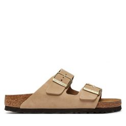 Klapki Birkenstock. Brązowe klapki Birkenstock, bez wzorów, bez obcasa, bez zapięcia. Za 579.99 zł.