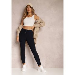 Granatowe Legginsy Cecrous. Niebieskie legginsy Renee, z aplikacjami, eleganckie, długie. W wyprzedaży za 23.99 zł.