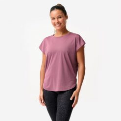 Koszulka fitness damska Domyos krótki rękaw. Fioletowe t-shirty sportowe DOMYOS, l, bez wzorów, z materiału, bez ramiączek, na fitness i siłownię. Za 59.99 zł.