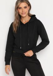 Czarna Bluza z Dodatkiem Bawełny z Kapturem Wykończona Ściągaczami Evista. Czarne bluzy Born2be, l, bez wzorów, z bawełny, z kapturem. W wyprzedaży za 38.24 zł.