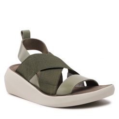 Sandały Fly London. Zielone sandały Fly London, bez wzorów, bez obcasa, na koturnie, bez zapięcia. Za 449.99 zł.