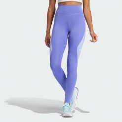 Legginsy Own The Run Colorblock Full-Length. Niebieskie legginsy adidas, bez wzorów, z elastanu. Za 311.10 zł.