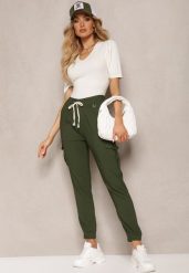 Ciemnozielone Spodnie High Waist o Fasonie Bojówek Istredda. Zielone jeansy Renee, l, bez wzorów, z jeansu, militarne, z podwyższonym stanem. W wyprzedaży za 39.99 zł.