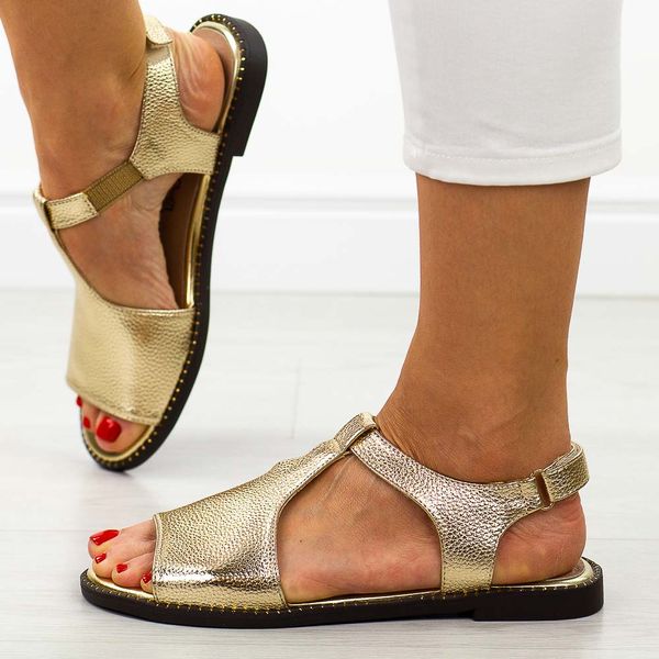 Złote sandały damskie M.Daszyński 24148-1. Żółte sandały M.Daszyński, bez wzorów, z jeansu, eleganckie, bez obcasa, na płaskiej podeszwie, bez zapięcia. Za 159.00 zł.