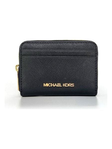 Michael Kors Skórzany portfel w kolorze czarnym - 12 x 8 x 2 cm rozmiar: onesize. Czarne portfele Michael Kors, bez wzorów, z materiału. Za 384.71 zł.