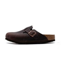 Kapcie Birkenstock Boston Damskie. Brązowe kapcie Birkenstock, bez wzorów, z materiału. Za 655.90 zł.