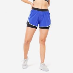 Spodenki fitness cardio damskie Domyos FST 900. Niebieskie szorty sportowe DOMYOS, bez wzorów, z materiału, na fitness i siłownię. Za 59.99 zł.