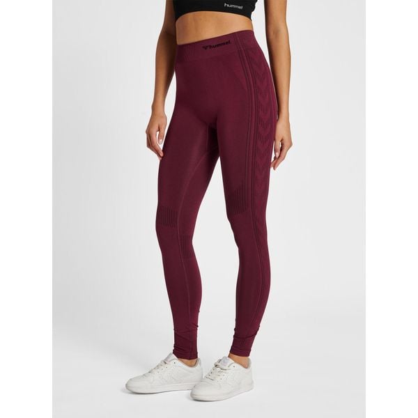 Damskie legginsy bezszwowe Hummel Shaping. Brązowe legginsy Hummel, bez wzorów, sportowe. Za 130.50 zł.