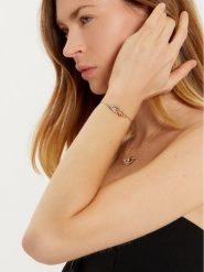 Tory Burch Naszyjnik Interlocking Wishbone Pendant 161070 Złoty. Żółte naszyjniki Tory Burch, z tworzywa sztucznego, metalowe. Za 669.99 zł.
