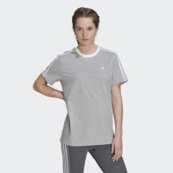 Koszulka fitness damska Adidas Essentials 3-Stripes Tee. Białe t-shirty sportowe adidas, xs, bez wzorów, z bawełny, bez ramiączek, na fitness i siłownię. Za 119.10 zł.