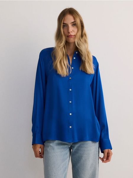 Koszula z wiskozy - niebieski. Niebieskie koszule Reserved, l, bez wzorów, z wiskozy, bez kołnierzyka, bez ramiączek. W wyprzedaży za 59.99 zł.