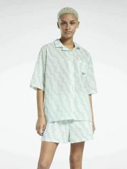 Reebok Koszula "Summer Waves" w kolorze zielonym rozmiar: S. Zielone koszule Reebok, s, bez wzorów, bez kołnierzyka, bez ramiączek. Za 88.23 zł.