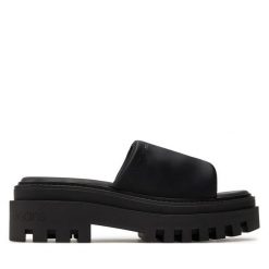 Klapki Calvin Klein Jeans. Czarne klapki Calvin Klein Jeans, bez wzorów, z jeansu, bez obcasa, bez zapięcia. Za 519.99 zł.