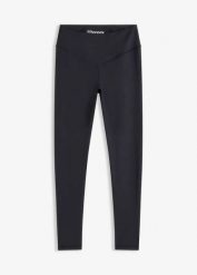 Modelujące legginsy sportowe o bawełnianej fakturze. Czarne legginsy bonprix, bez wzorów, z bawełny, sportowe. Za 124.99 zł.