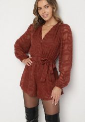 Brązowy Krótki Kombinezon z Siateczkowymi Rękawami i Wiązanym Paskiem Zenalea. Brązowe sukienki Born2be, na imprezę, l, bez wzorów, eleganckie, bez kołnierzyka, bez ramiączek, mini. Za 149.99 zł.