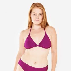 Góra kostiumu kąpielowego surfingowego damska Olaian Mae teksturowana. Fioletowe bikini OLAIAN, bez wzorów, z elastanu, sportowe. W wyprzedaży za 19.99 zł.