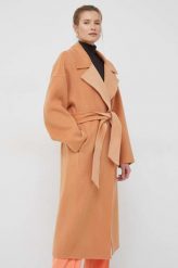 Calvin Klein płaszcz wełniany kolor pomarańczowy przejściowy oversize. Brązowe płaszcze Calvin Klein, bez wzorów, z wełny, bez kaptura. Za 2,289.90 zł.