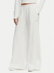 Tommy Jeans Spodnie dresowe Metallic Logo DW0DW22735 Biały Wide Leg. Białe spodnie sportowe Tommy Jeans, bez wzorów, z bawełny. Za 409.99 zł.