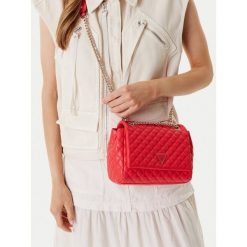 Torebka Guess. Pomarańczowe kopertówki Guess, z aplikacjami, wizytowe, bez dodatków. Za 299.99 zł.