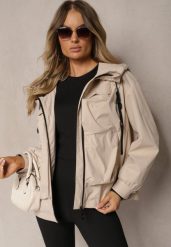 Beżowa Kurtka o Fasonie Wiatrówki Ozdobiona Kieszeniami Bralisa. Brązowe kurtki Renee, l, bez wzorów, z jeansu, eleganckie, bez kaptura. W wyprzedaży za 149.99 zł.