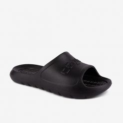 Klapki damskie Coqui Viki - czarne Coquiair. Czarne klapki Coqui, bez wzorów, z materiału, eleganckie, bez obcasa, bez zapięcia. Za 125.99 zł.