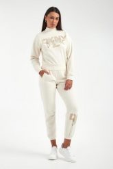 Spodnie dresowe damskie DKNY. Spodnie sportowe DKNY, bez wzorów, z dresówki. Za 399.00 zł.