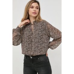 Liu Jo bluzka damska kolor brązowy wzorzysta. Brązowe bluzki Liu Jo, bez wzorów, z tkaniny, bez kołnierzyka, bez ramiączek. W wyprzedaży za 569.99 zł.