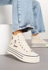 Beżowe Trampki na Platformie Ozdobione Metalicznymi Aplikacjami Jalzedis. Brązowe trampki Renee, z aplikacjami, z jeansu, eleganckie, bez zapięcia. W wyprzedaży za 75.99 zł.