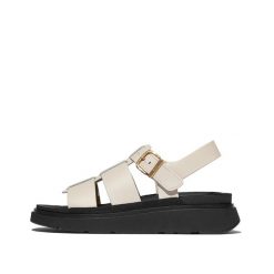 Klapki na koturnie w stylu rybaka damskie FitFlop Gen-FF. Czarne klapki FIT FLOP, bez wzorów, z materiału, klasyczne, bez obcasa, na koturnie, bez zapięcia. Za 736.00 zł.
