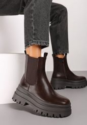 Brązowe Botki Sztyblety Grunge na Grubej Podeszwie z Elastyczną Wstawką Fortinas. Brązowe botki Born2be, bez wzorów, z jeansu, eleganckie, z okrągłym noskiem, bez obcasa, na płaskiej podeszwie, bez zapięcia. W wyprzedaży za 127.49 zł.