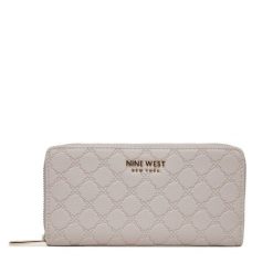 Portfel Nine West. Fioletowe portfele Nine West, bez wzorów. Za 79.99 zł.