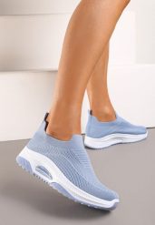 Niebieskie Casualowe Buty Sportowe na Grubszej Podeszwie Ozdobione Perforacją Fiovena. Niebieskie buty sportowe lifestyle Renee, bez wzorów, z jeansu, bez zapięcia. W wyprzedaży za 43.99 zł.