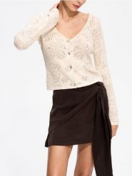 Crochetowy kardigan w autorski wzór - kremowy. Białe swetry Reserved, l, bez wzorów, z bawełny, bez ramiączek. Za 279.99 zł.