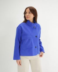 Krótka niebieska kurtka. Niebieskie kurtki Unisono, l, bez wzorów, z dzianiny, bez kaptura. Za 339.00 zł.