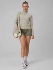 4F Legginsy krótkie treningowe damskie - oliwkowe M. Brązowe legginsy 4f, bez wzorów, sportowe, krótkie. Za 79.99 zł.