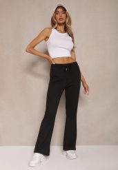 Czarne Dresowe Spodnie Flare z Gumką w Pasie Efranaria. Czarne jeansy Renee, bez wzorów, z dresówki, eleganckie. W wyprzedaży za 35.99 zł.