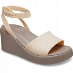 Sandały dla Kobiet Crocs Brooklyn Ankle Strap Wedge. Brązowe sandały Crocs, bez wzorów, z materiału, eleganckie, bez obcasa, na koturnie, bez zapięcia. Za 209.99 zł.